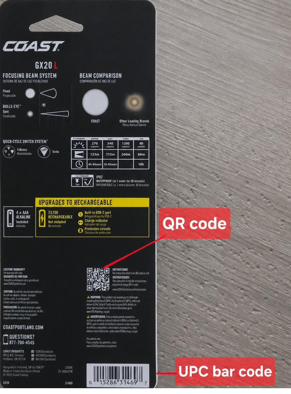 Hand holding a product box with the thumb covering the QR code so only the UPC faces the scanner
