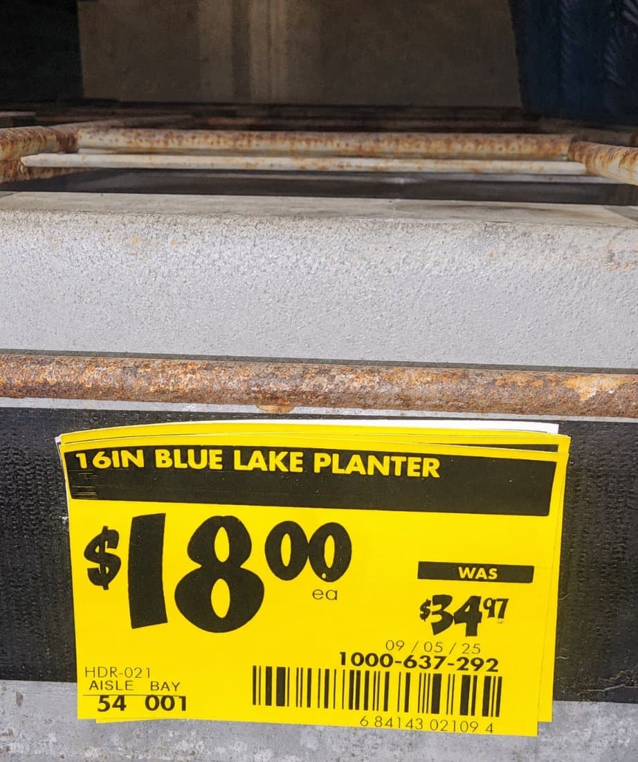 Older-style yellow Home Depot clearance tag with no Clearance wording, a date in the corner, and a shelf-tag barcode